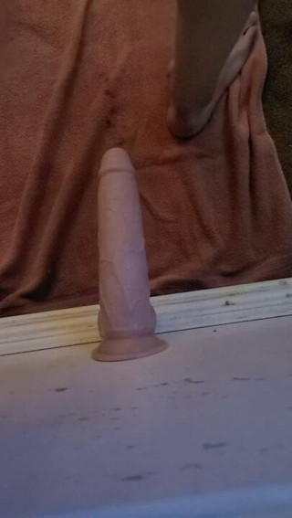 Little slut takes huge dildo