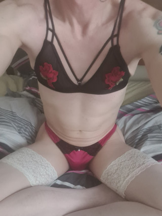 wearing my red lingerie whilst toying my hole.