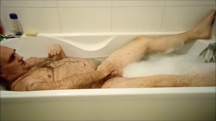 Hot man masturbating in his bath