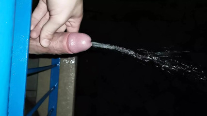 Peeing from the balcony while it rains. Dick german dick pissing outdoor.