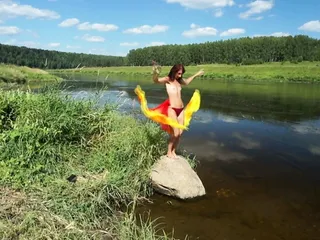 Color Fans on Boulder in Volga River