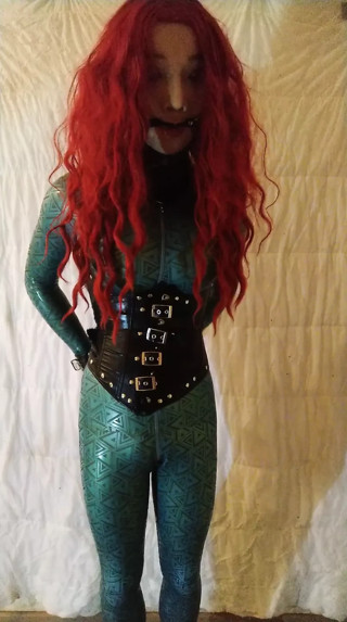 Latex redhead doll vibrates