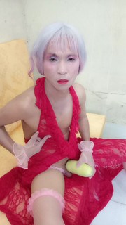 Transgender Le wearing a sexy dress erotic masturbating with a fake can