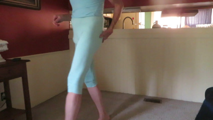 Crossdressing bitch in skin-tight leggings.