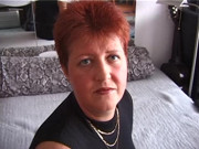 Redhead playing with her fingers and his cock