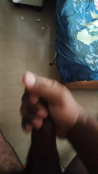 Brown man playing with his dick