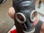 Cumshot on gas mask