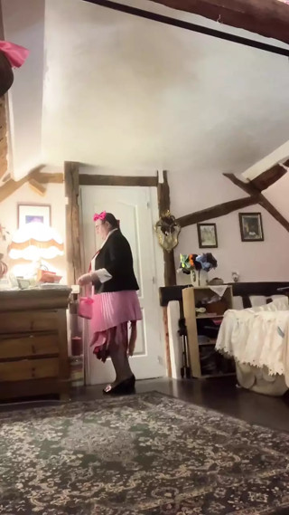 Dressed with a little pink pleated skirt for an evening