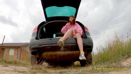 Smoking with her bladder full