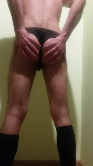 Majk is trying on his Aunt's panties and knee socks thumbnail