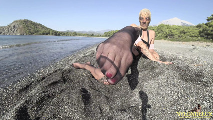 fetish out fit on the beach 4k