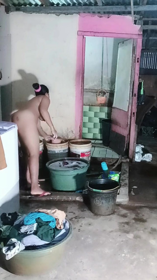 Washing clothes while naked