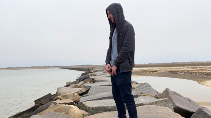 Peeing on the Rocks by the Ocean thumbnail