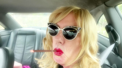 MRS ROMAN SMOKING HER LONG VS120 MENTHOLS IN THE CAR thumbnail