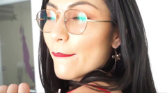 Latina with a Sensual Body Posing in Her Latex Skirt