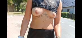 walking down the street in a see-through blouse public flashing of tits and pussy