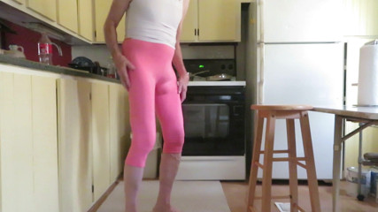 Crossdressing slut in tight leggings.