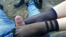 Footjob in the city park