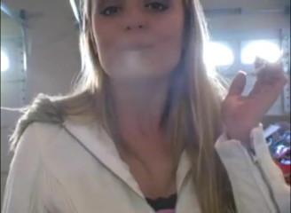 Slutty teens smoking a cigarettes in close up video