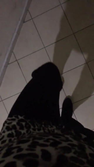 SEXY CROSSDRESSER IN LEGGINGS AND BOOTS