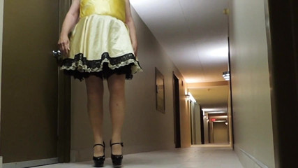 Sissy Ray in Hotel Corridor in Sissy Dress and Sexy Heels