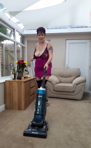 Doing a spot of housework in inappropriate clothing!