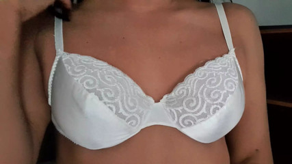 Caresing my boobs in white satin 34B bra thumbnail