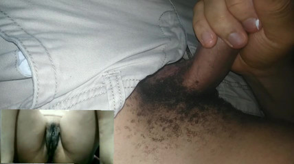 Masturbating