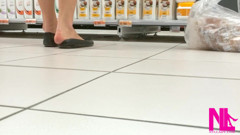 Footplay and Dipping in Black Flats at a Conad Store