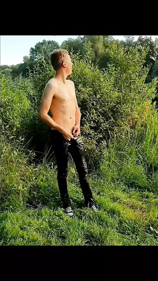 Twink getting soaked and showing ass and cock in public
