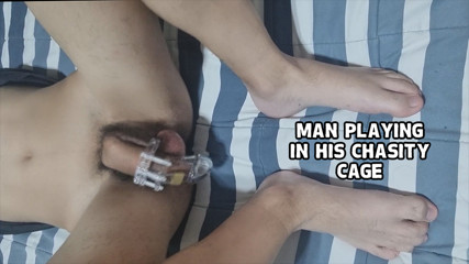 Man Playing in His Chasity Cage