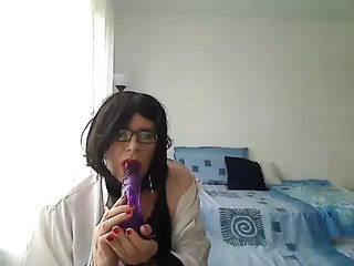 MILF tranny simulates a Blowjob by playing with a vibrator thumbnail
