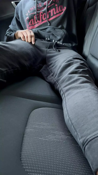 Cock and feet in car
