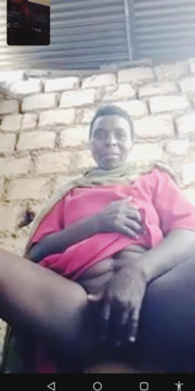 Hadzabe Tribe Mature Woman on Video Call with BF, Don't Ask Me Where She Got the Phone.