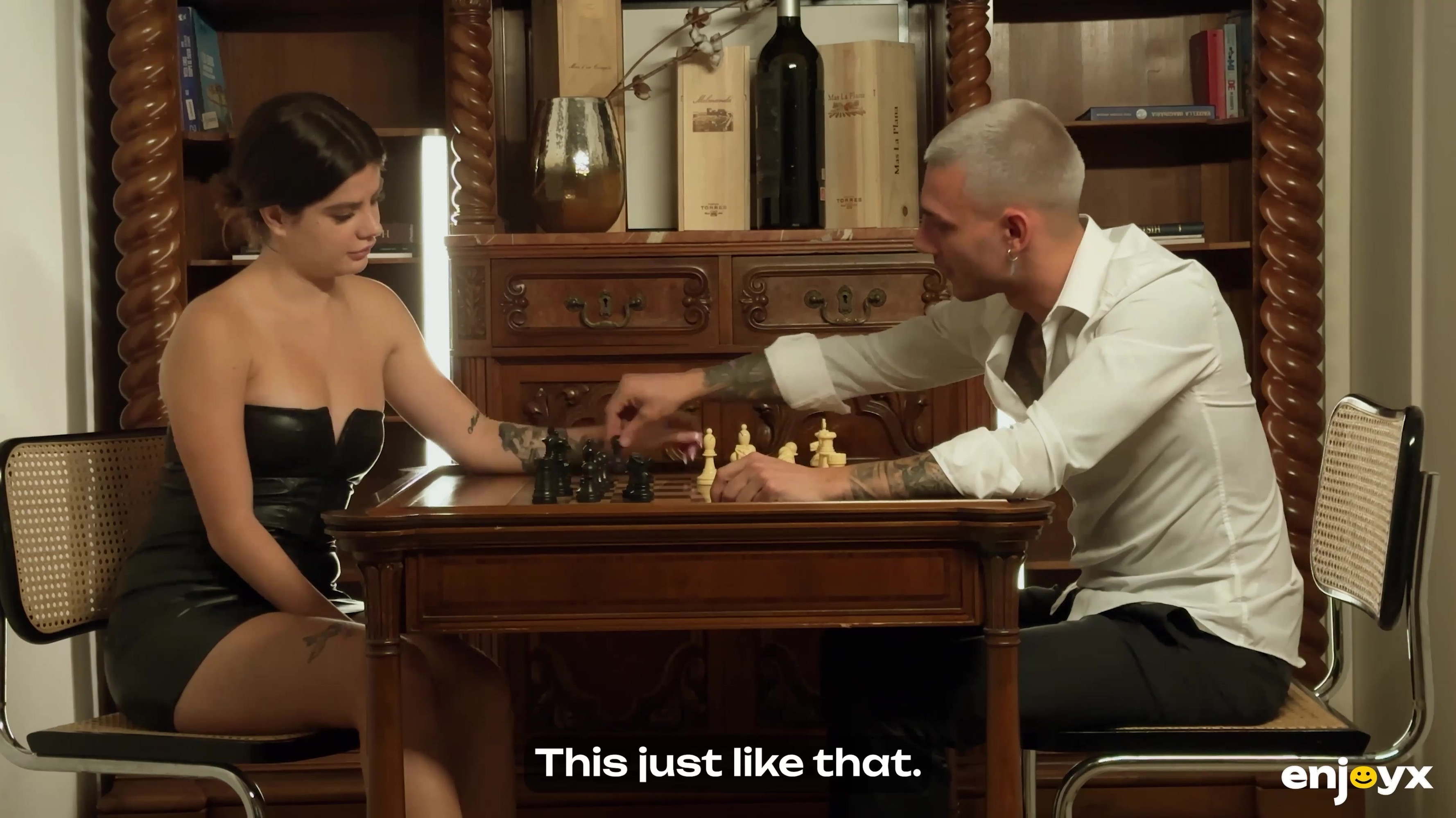 He teaches her how to play chess, but she's thinking about how to stick his dick in her ass