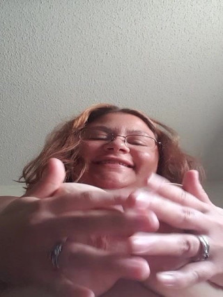 Wife sucking on tits