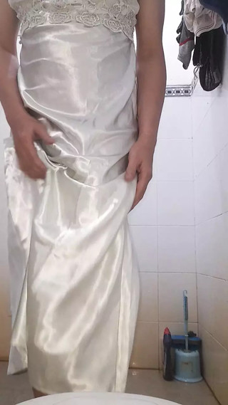 Asian Crossdresser wearing long silky nightie gown