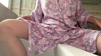 Pampered on Sundays in a bathrobe and anal plug