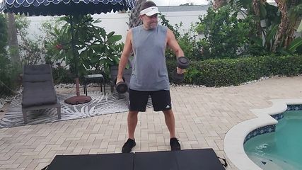Muscle daddy loses his clothes during workout
