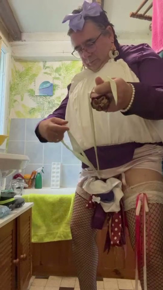 Dressed in a bubble skirt to pee into a bottle