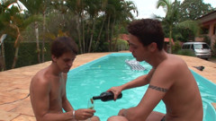 Two gays fuck and cum by the swimming pool