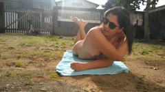 Wife sunbathing naked in front yard