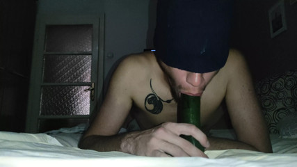 Deep sucking a huge cucumber