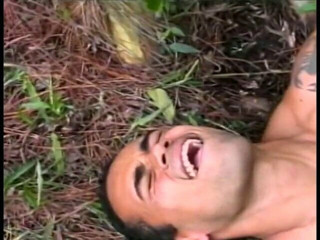 Young Latino gets drilled by a gay stud lying on a tree trun