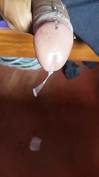 Penis peeps through my pants and says hello  to the world, so I give it a good rub down.