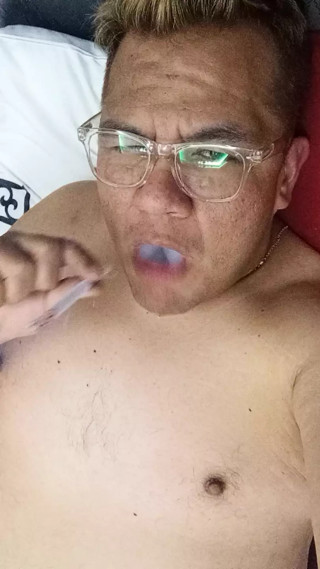 Chubby bator mexican smoking and playing in hotel