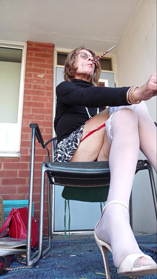 More Smoking like a Slut on Friend's Balcony thumbnail