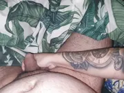 Tattooed step mom plays with step son dick while waching a movie 