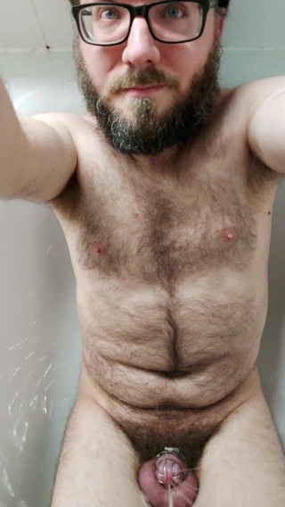 Locked hairy guy piss fountain
