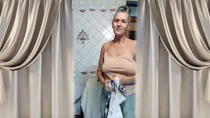 Hot Housewife Lukerya Dances in the Kitchen in the Morning.